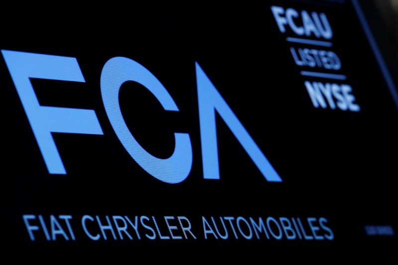 © Reuters. A screen displays the ticker information for Fiat Chrysler Automobiles NV at the post where it's traded on the floorof the NYSE