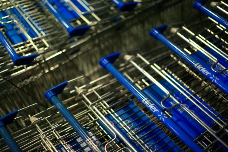 © Reuters. Shopping carts are seen at a supermarket brand of Wal-Mart company, in Santiago