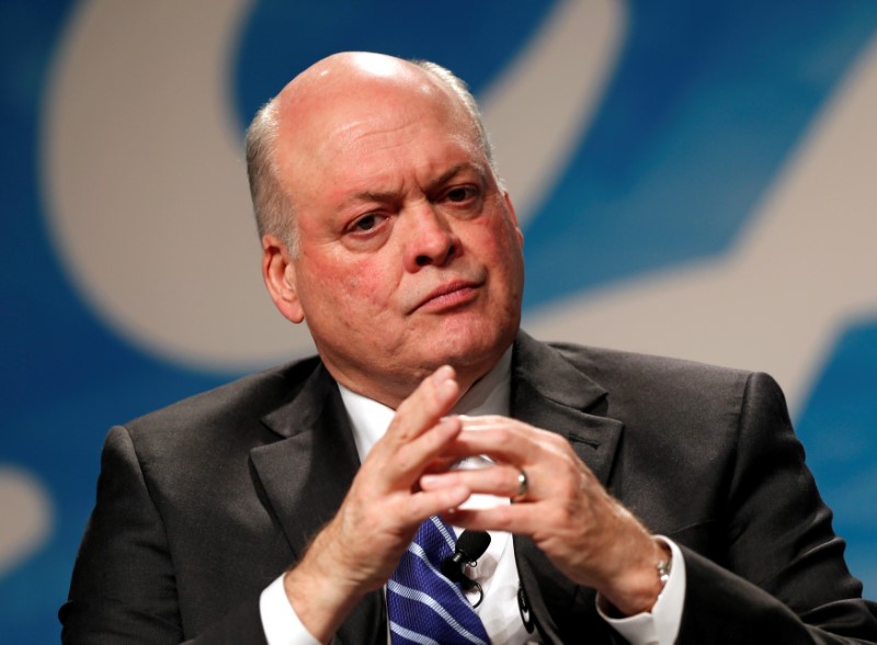 © Reuters. Newly named Ford Motor Company president and CEO James Hackett answers questions during a press conference at Ford Motor World Headquarters in Dearborn,