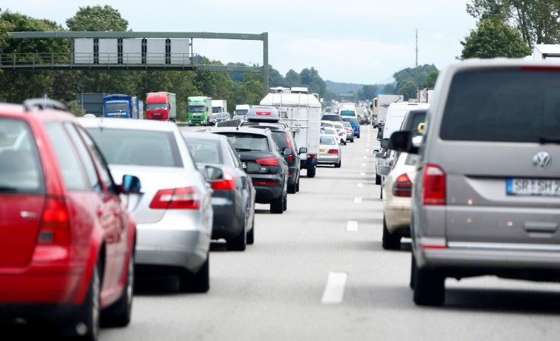 © Reuters. Cars and trucks are stuck in traffic jam near Irschenberg