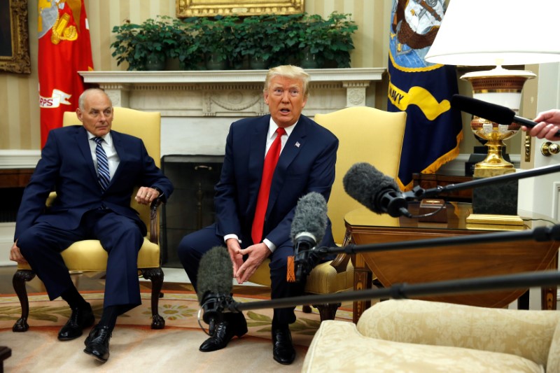 © Reuters. U.S. President Donald Trump speaks to journalists after John Kelly was sworn in as White House Chief of Staff in the Oval Office of the White House in Washington