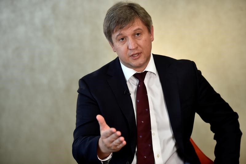 © Reuters. Ukraine's finance minister Danylyuk speaks to a Reuters journalist during an interview in London