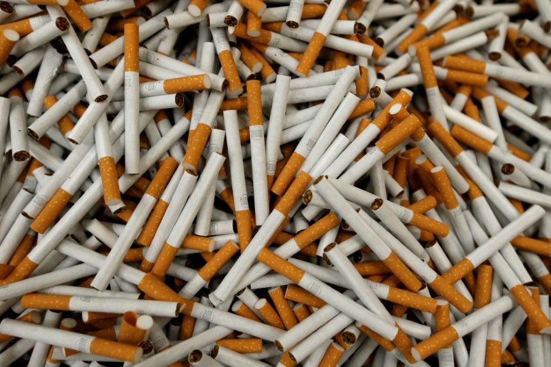 © Reuters. FILE PHOTO: Lucky Strike cigarettes seen during manufacturing process in BAT cigarette factory