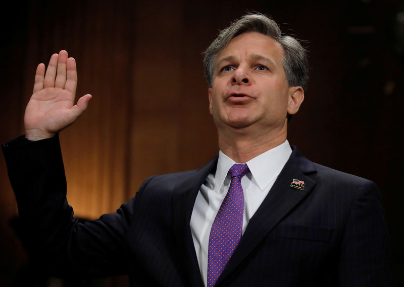 © Reuters. Wray is sworn in prior to testifying before Senate Judiciary Committee confirmation hearing on Capitol Hill in Washington