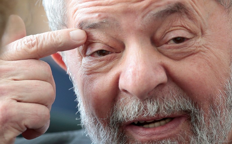 © Reuters. FILE PHOTO: Former Brazilian President Luiz Inacio Lula da Silva reacts as he attends the funeral of Marco Aurelio Garcia in Sao Paulo