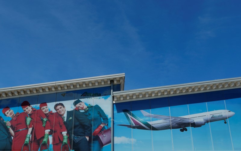 © Reuters. Advertising is seen at Alitalia headquarters at Rome's Leonardo da Vinci–Fiumicino Airport