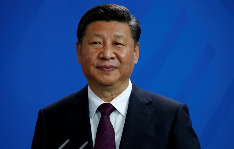 © Reuters. FILE PHOTO: Chinese President Xi Jinping attends a news conference at the Chancellery in Berlin