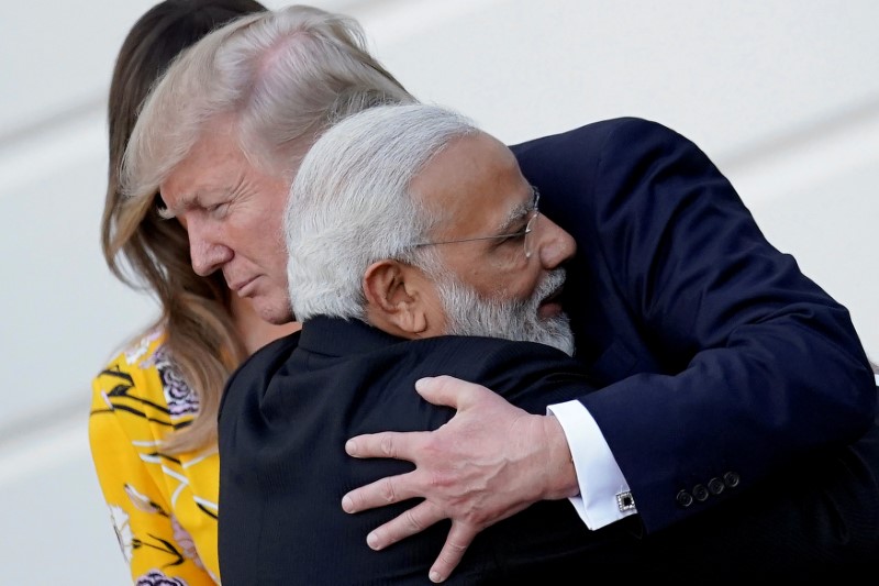 © Reuters. FILE PHOTO: India's Prime Minister Narendra Modi hugs U.S. President Donald Trump as he departures the White House after a visit, in Washington, U.S.