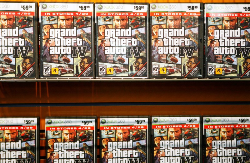 © Reuters. FILE PHOTO: "Grand Theft Auto IV" video game boxes are displayed on a rack inside a GameStop store in New York prior to midnight release of the video game