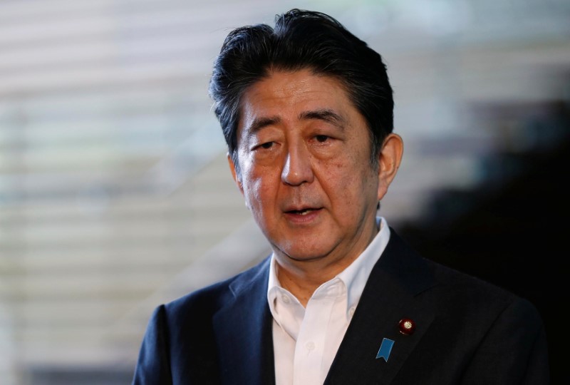 © Reuters. Japan's PM Abe speaks to the media at his official residence in Tokyo