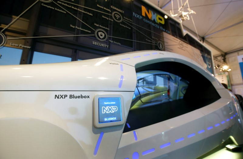 © Reuters. A display on automotive technology is shown in the NXP Semiconductors booth during the 2017 CES in Las Vegas