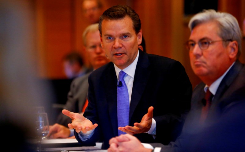 © Reuters. FILE PHOTO: CEO Kottmann of Swiss chemical company Clariant sits beside Huntsman President and CEO Huntsman as he addresses news conference in Zurich