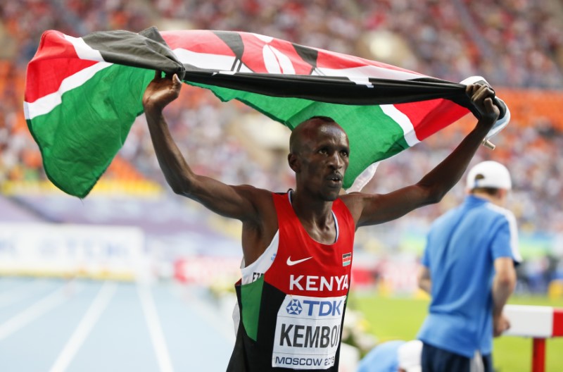 © Reuters. Kemboi of Kenya celebrates his victory in the men's 3000 metres steeplechase final of the IAAF World Athletics Championships at the Luzhniki Stadium in Moscow