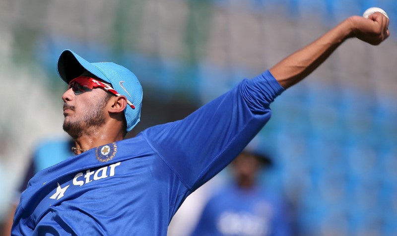 © Reuters. India's Patel bowls in the nets during a practice session ahead of their first one-day international cricket match against South Africa in Kanpur