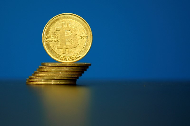 © Reuters. FILE PHOTO:An illustration photo of Bitcoin (virtual currency) coins are seen at La Maison du Bitcoin in Paris