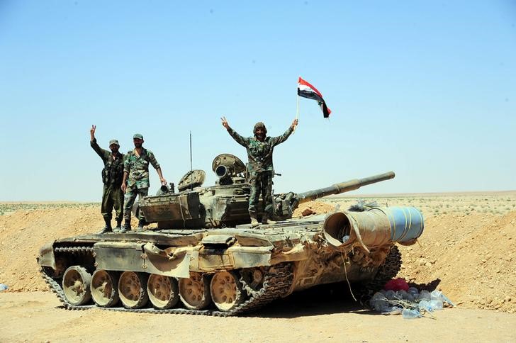 © Reuters. تقارير إعلامية: الجيش السوري يحكم سيطرته على مدينة السخنة في حمص