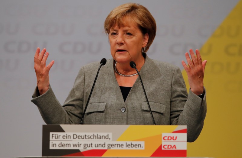 © Reuters. German Chancellor Merkel starts the CDU's election campaign rally for Germany's general eletion in Dortmund