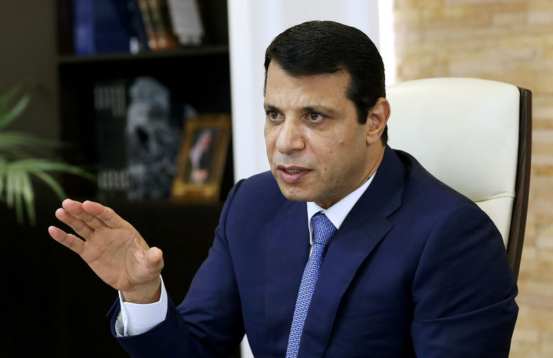 © Reuters. FILE PHOTO: Mohammed Dahlan, a former Fatah security chief, gestures in his office in Abu Dhabi