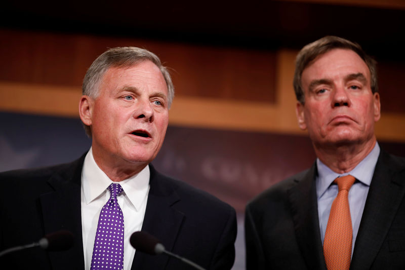 © Reuters. Sen. Richard Burr (R-NC), accompanied by Sen. Mark Warner (D-VA), gives an update on the ongoing investigation into Russian involvement in the 2016 election at the Capitol Building in Washington