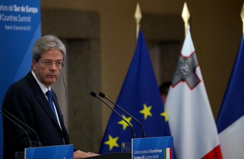 © Reuters. Italy's PM Gentolini attends a news conference at the end of Southern EU Countries summit in Madrid