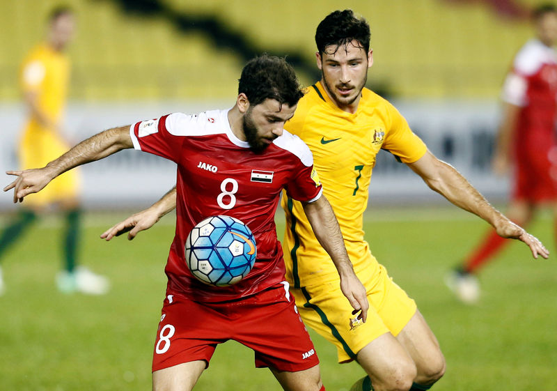 © Reuters. سوريا تواصل الكفاح وتتعادل مع استراليا في تصفيات كأس العالم