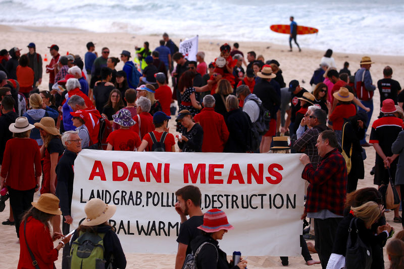 Thousands protest across Australia against giant Adani coal mine By Reuters