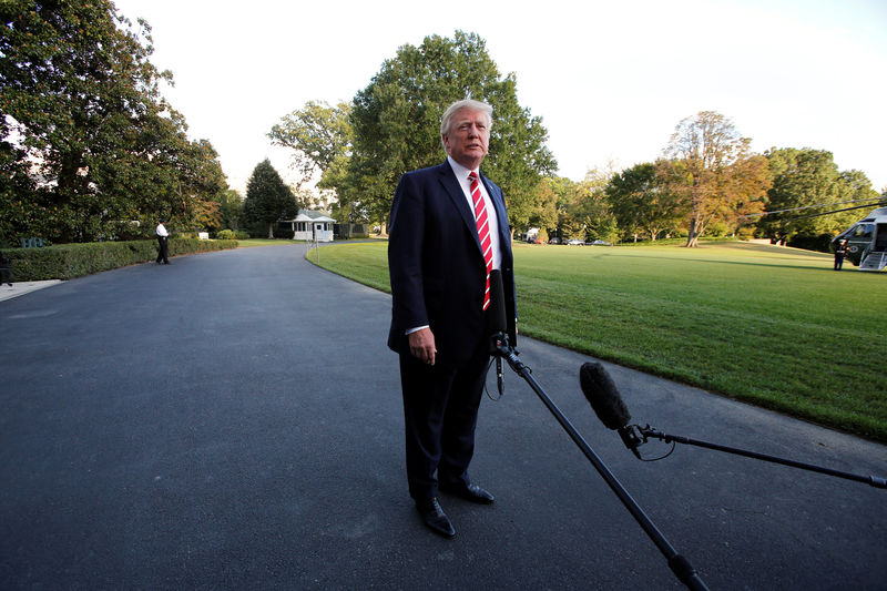 © Reuters. President Donald Trump talks to the media