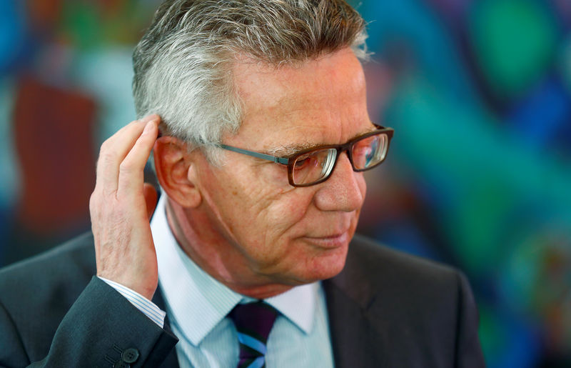 © Reuters. German Interior Minister Maiziere arrives for the weekly cabinet meeting at the Chancellery in Berlin