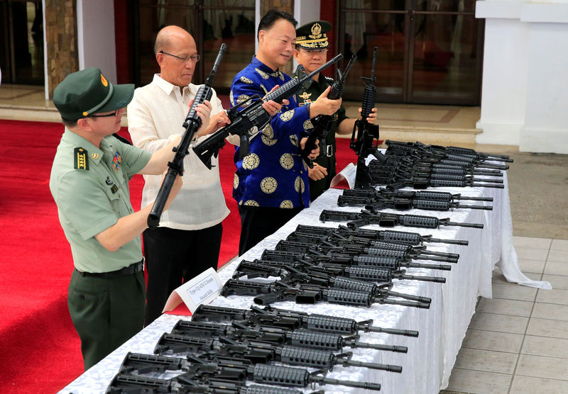 © Reuters. Turnover ceremony of China's urgent military assistance to the Philippines at the military camp in Camp Aguinaldo in Quezon city, metro Manila