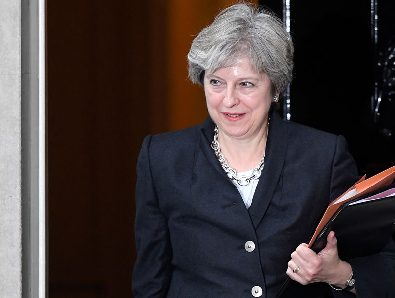 © Reuters. Theresa May deixa seu gabinete no centro de Londres