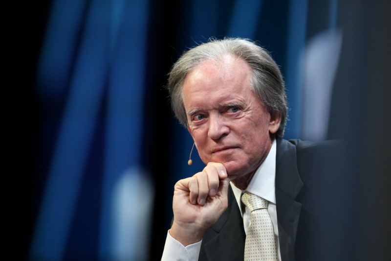 © Reuters. FILE PHOTO: Janus Capital Group's Bill Gross listens during the Milken Institute Global Conference in Beverly Hills