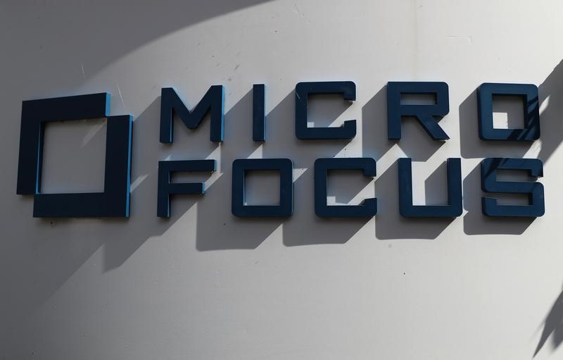 © Reuters. FILE PHOTO: A sign stands outside the offices of Micro Focus in Newbury
