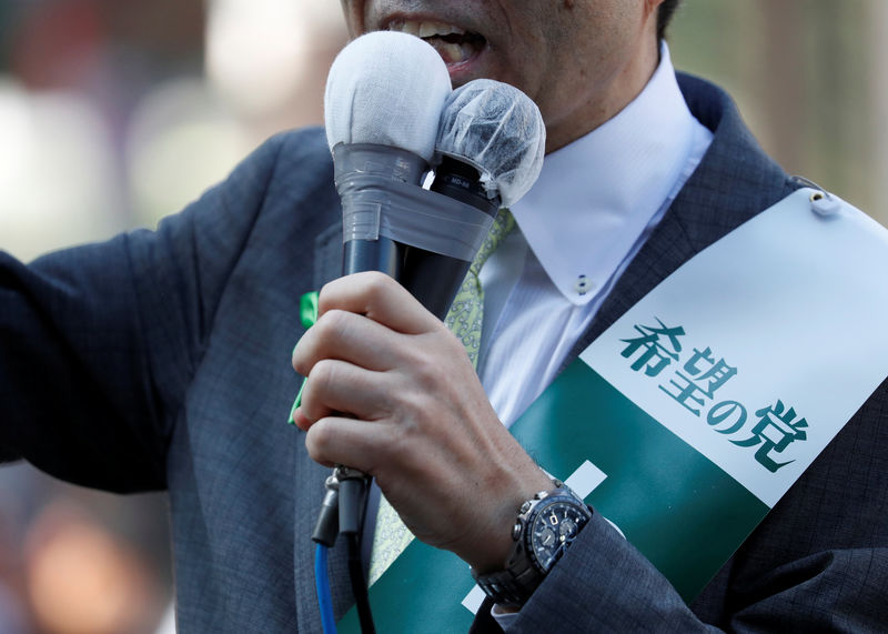 © Reuters. A candidate from Japan's Party of Hope delivers a speech during an election campaign rally in Tokyo