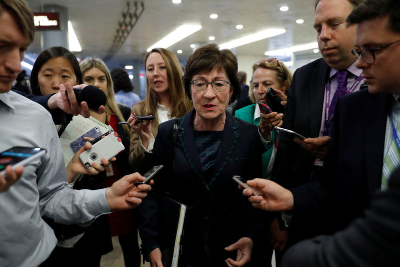 © Reuters. FILE PHOTO - Sen. Susan Collins (R-ME) speaks with reporters ahead of the party luncheons on Capitol Hill in Washington