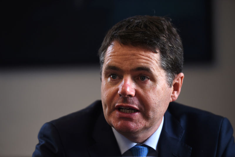 © Reuters. FILE PHOTO: Irish Minister for Public Expenditure Paschal Donohoe speaks during an interview with Reuters at the Ministry of Finance in Dublin