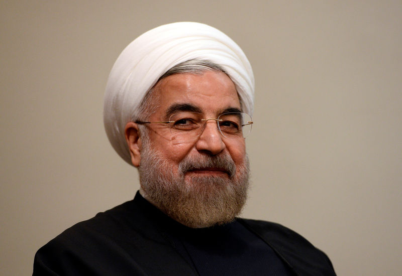 © Reuters. FILE PHOTO - Iran's President Hassan Rouhani listens during a meeting with U.N. Secretary-General Ban Ki-moon on the sidelines of the U.N. General Assembly in New York