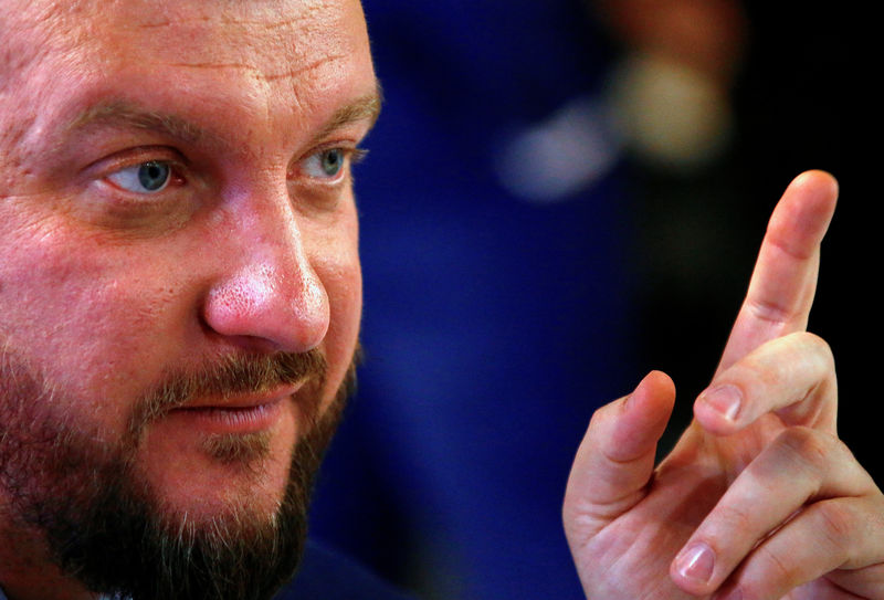 © Reuters. Ukraine's Justice Minister Pavlo Petrenko reacts as he answers a question during an interview in Sydney