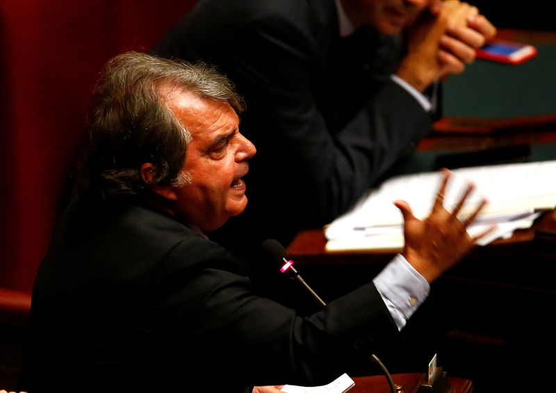 © Reuters. Forza Italia member Renato Brunetta gestures at the Lower House of the Parliament during a vote for electoral law in Rome