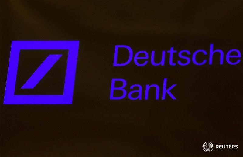 © Reuters. A Deutsche Bank sign is seen on the floor of the New York Stock Exchange