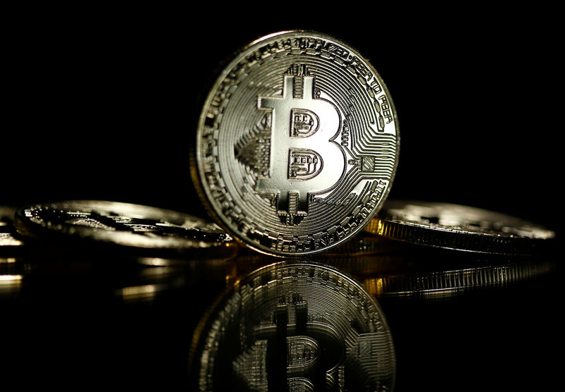 © Reuters. Bitcoins are seen in this illustration picture
