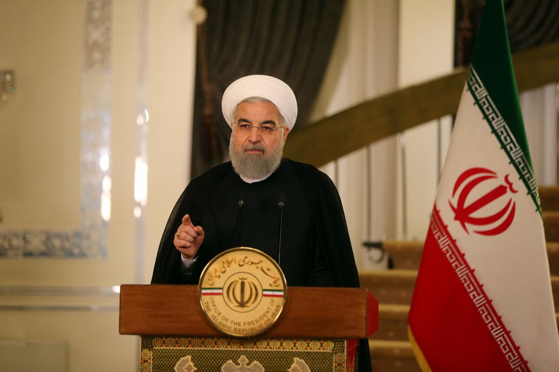 © Reuters. Iranian President Hassan Rouhani gestures during a television address in Tehran