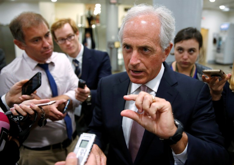 © Reuters. Senator Bob Corker (R-TN) speaks to reporters after the Senate approved $15.25 billion in aid for areas affected by Hurricane Harvey in Washington
