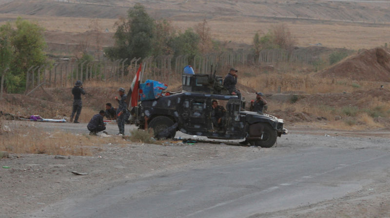 © Reuters. مسؤولون عراقيون وأكراد:القوات العراقية تتقدم صوب مدينة كركوك التي يسيطر عليها الأكراد