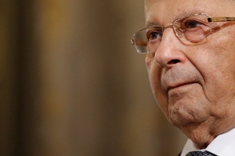 © Reuters. Lebanon's President Michel Aoun reacts at the City Hall as part of a state visit in Paris