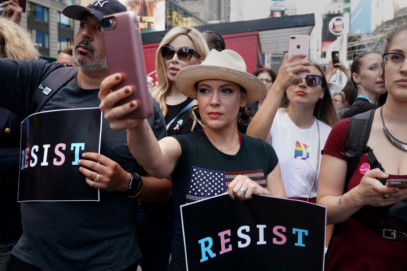 © Reuters. FILE PHOTO: Actress Alyssa Milano attends a protest in Times Square, New York City