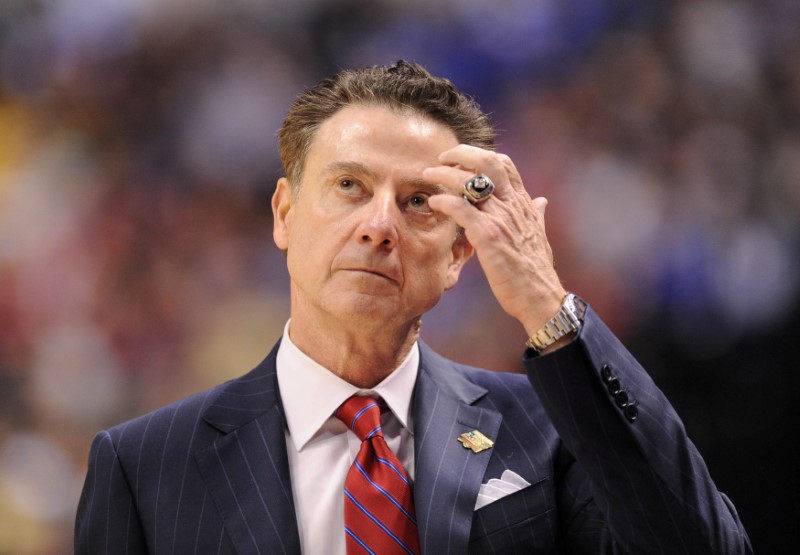 © Reuters. FILE PHOTO: Louisville Cardinals head coach Rick Pitino reacts against the Michigan Wolverines during the second half in the second round of the 2017 NCAA Tournament in Indianapolis