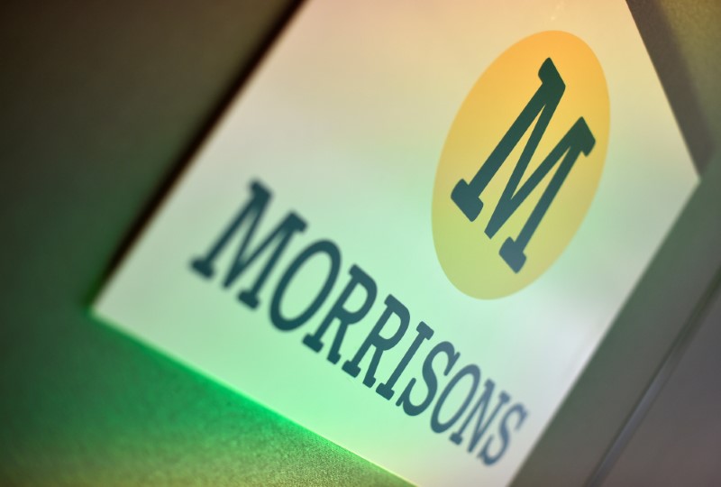 © Reuters. FILE PHOTO - Branding for Morrisons is seen in a conference room in central London