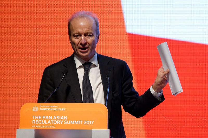 © Reuters. Ashley Alder, Chief Executive Officer of Hong Kong Securities and Futures Commission, addresses the Pan Asian Regulatory Summit in Hong Kong