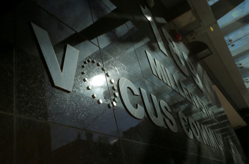 © Reuters. FILE PHOTO - The corporate logo of communications company Vocus is photographed at their Sydney headquarters, Australia