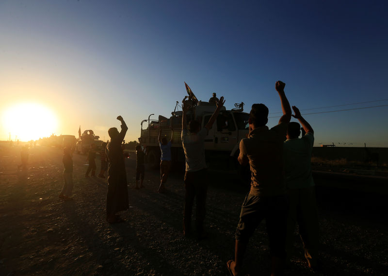 © Reuters. قائد عسكري عراقي: القوات الكردية تنسحب إلى خط يونيو 2014